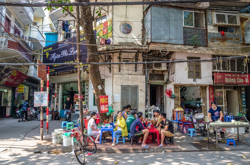 Enjoy breakfast by the street in Hanoi old quarter