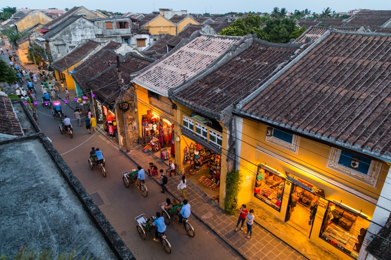 People walking on the streets of old town Hoi An, Vietnam
