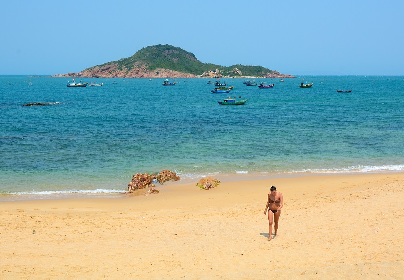 A Tourist enjoying beautiful beach in Quy Nhon, Vietnam