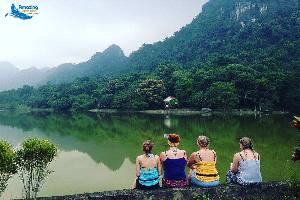 Tourists relax in a lake in Cuc Phuong National Park, Ninh Binh