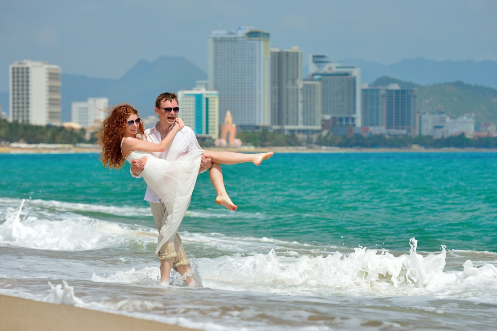 Happy couple on the beach of Nha Trang