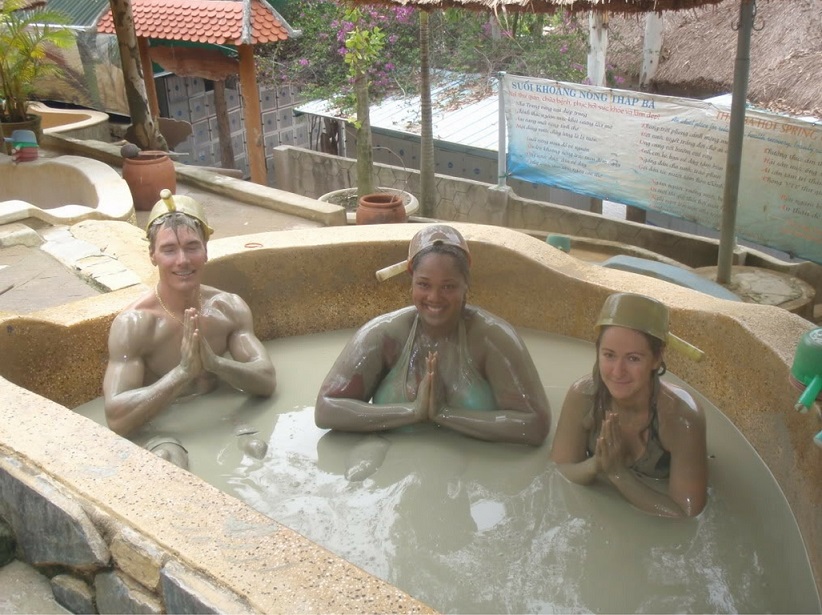 Tourists enjoy bath mud in Thap Ba Hot Springs in Nha Trang city, Vietnam