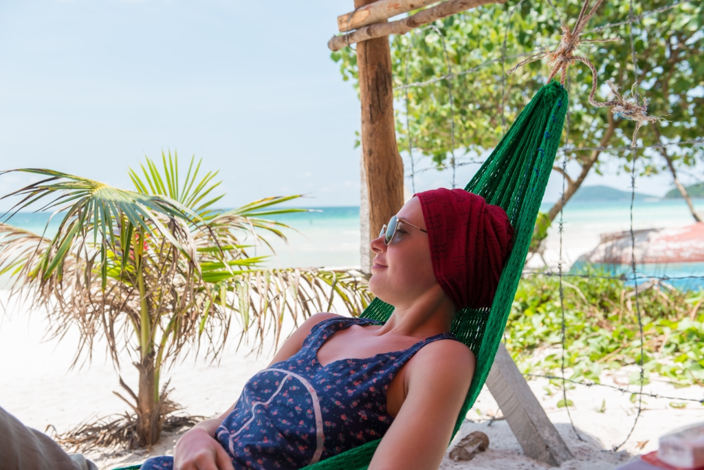A tourist relaxes at the Bai Sao Beach, Phu Quoc.