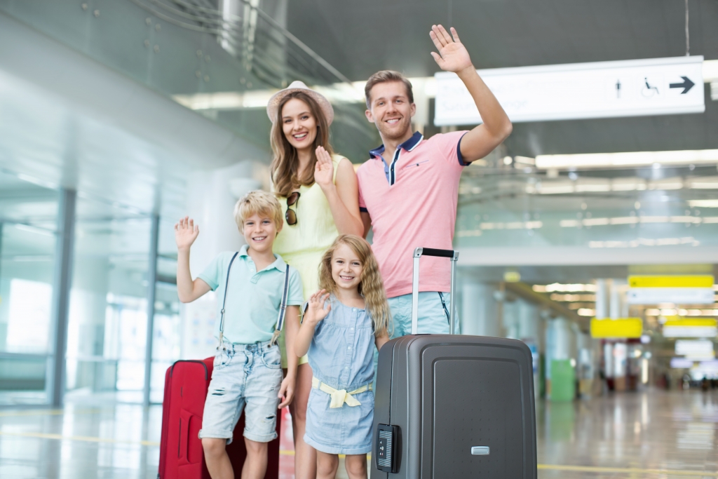 Family with luggage at the airport