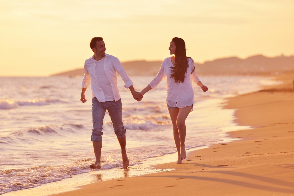 A couple in love having fun on beautiful beach of Vietnam