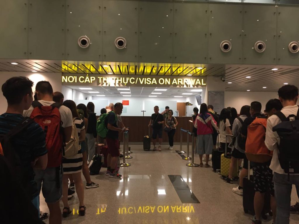 Tourist queue to pick up visa on arrival at Da Nang Int'l Airport, Vietnam